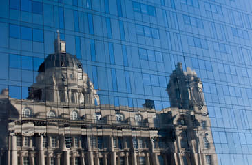 Port of Liverpool building reflected in all glass building