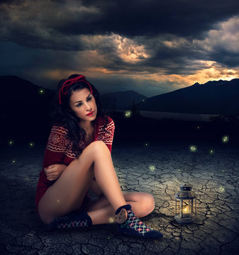 Fantasy style photo of a young beauty brunette woman