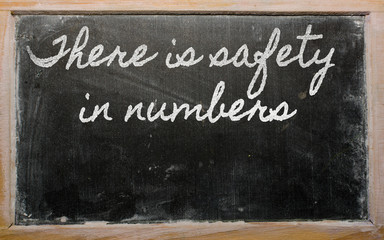 expression -  There is safety in numbers - written on a school b