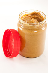 Jar of peanut butter with lid