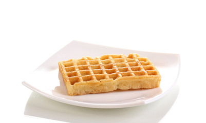 Sweet waffles on plate isolated on white