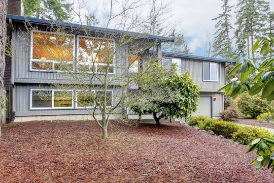 Simple Grey Brown Split Level American House.