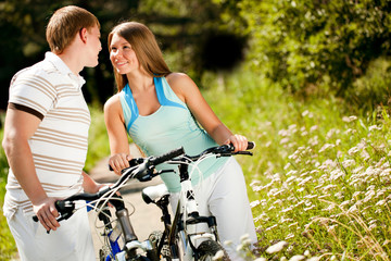 Obraz premium love going out in the park and ride a bicycle