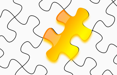 Glossy yellow puzzle on white paper