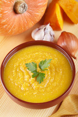 Pumpkin soup on the served table
