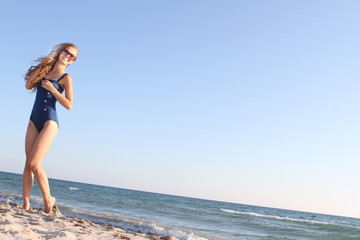 young happy woman on beach