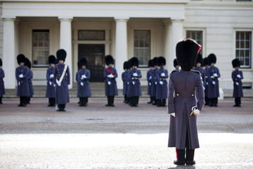 Grenadier guards wearing winter greatcoat