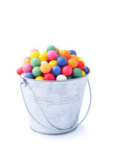 Colorful candy in a tin bucket