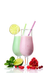 Milk shakes with fruits isolated on white