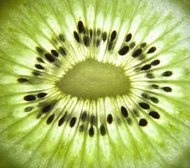 Papier Peint photo Tranches de fruits Fond de nourriture saine. Kiwi.