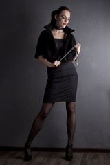 Redhead young girl in black dress