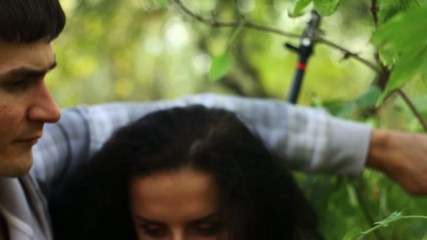 Close up of young hikers threading their way through a thicket