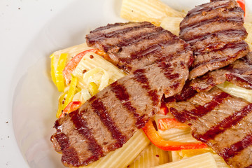 Rigatoni pasta with a beef and sauce