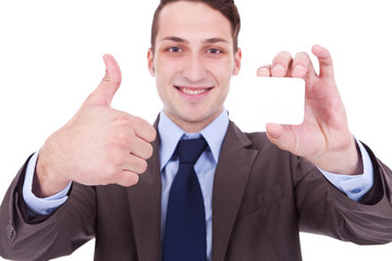 man showing a blank business card