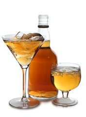 Two whiskey glasses cups and bottle