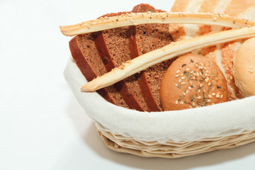 Fototapeta premium Fresh bread in the basket with copy space
