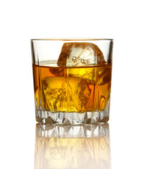 Glass of whiskey and ice isolated on white