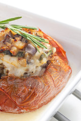 baked tomato with chicken meat and mushrooms