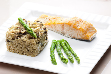 baked salmon with mushroom risotto and green asparagus
