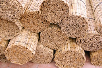 Mats of reed in roles