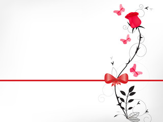 red rose with a bow