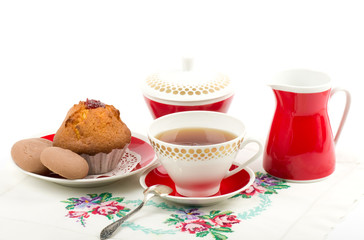 Beautiful tea set with cupcakes