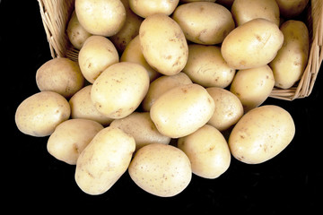 Potatoes on black