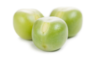 Fresh green peas isolated on white background