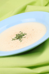 Potato cream soup with cress and nutmeg