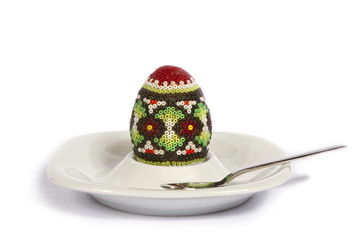 Easter Egg In Cup Isolated On White Background