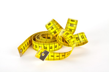 Yellow measure tape with scale in centimeters