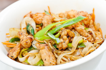 Teriyaki chicken with noodles and spring onions made in wok