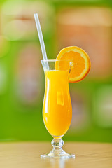 Freshly squeezed orange juice served in a hurricane glass