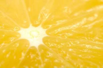 Afwasbaar Fotobehang Plakjes fruit Sappige Sinaasappel Macro