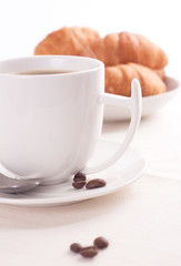 breakfast with croissants and coffee