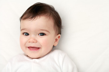 Gorgeous baby smiling to camera