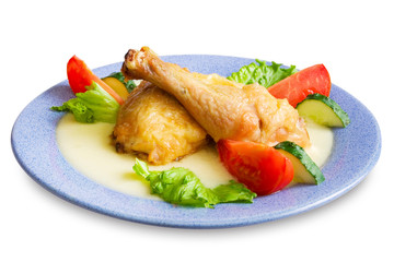 Chicken legs with vegetables and sauce