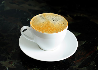 Cup of Coffee on Black Background
