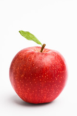 Red apple with a leaf