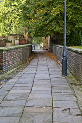 Old paved path next to Hexham Abbey grave yard
