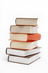 A stack of books on a white background.