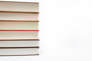 A stack of books on a white background.