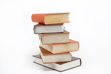 A stack of books on a white background.