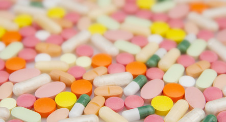 Fototapeta na wymiar Pills and capsules background