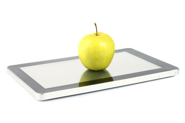 Touch screen device with a green apple on white background