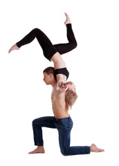 two young acrobats show stand on hand