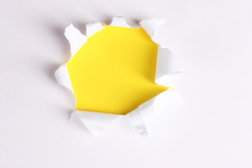 Torn paper  with yellow background