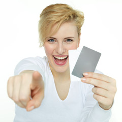 Happy woman showing her cards to you with copyspace