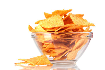 tasty potato chips in transparent bowl isolated on white
