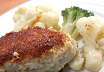 Cutlets in a plate with vegetables
